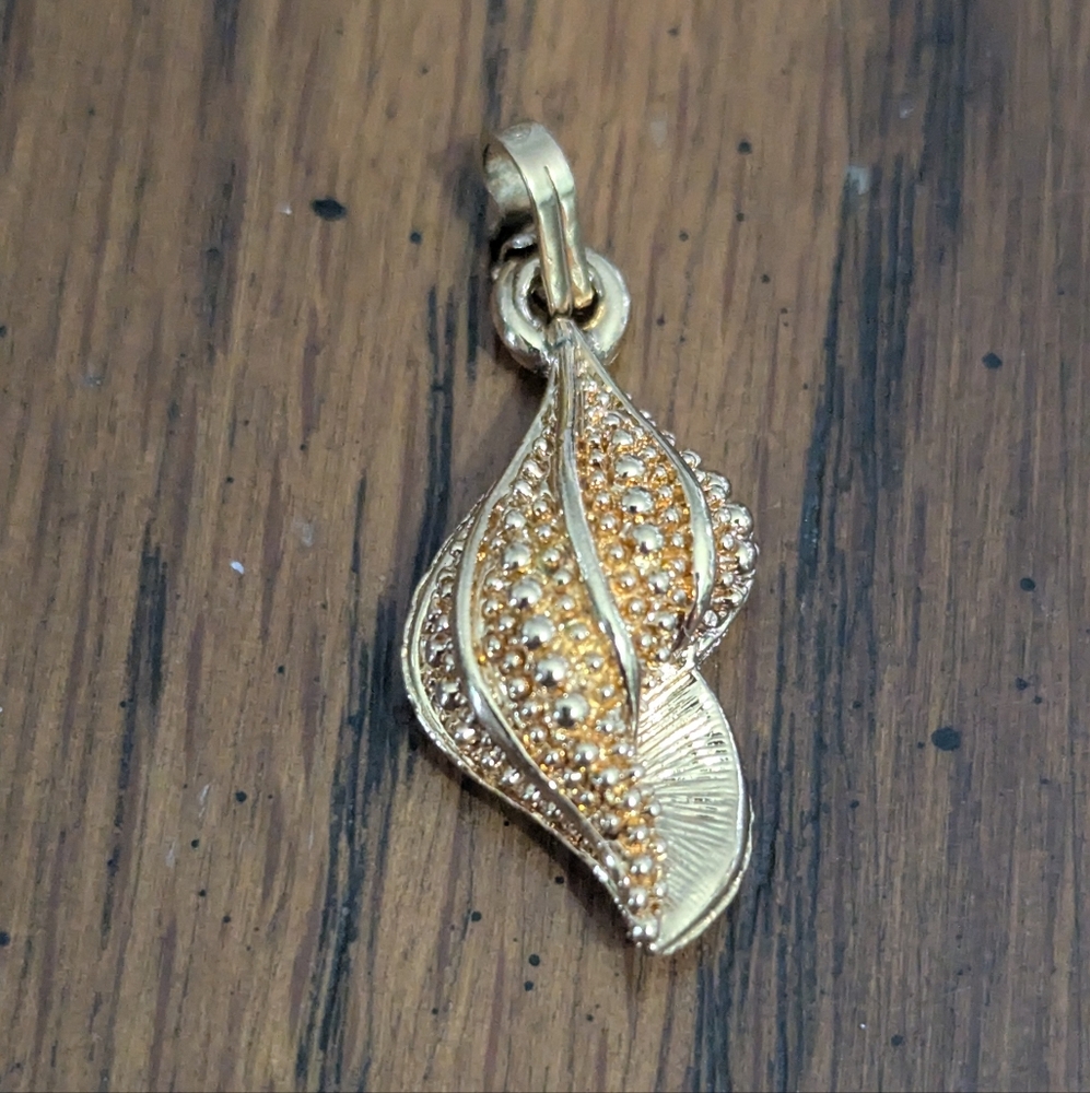 Elegant Vintage Monet Gold Conch Charm